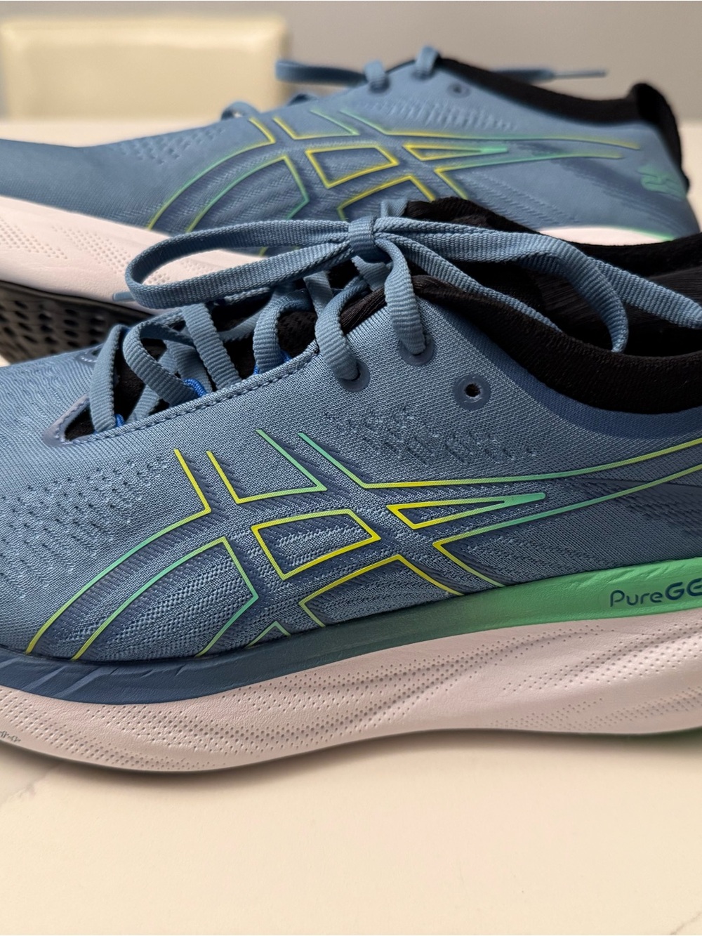 ASICS Light Blue Running Shoes with Green Accents